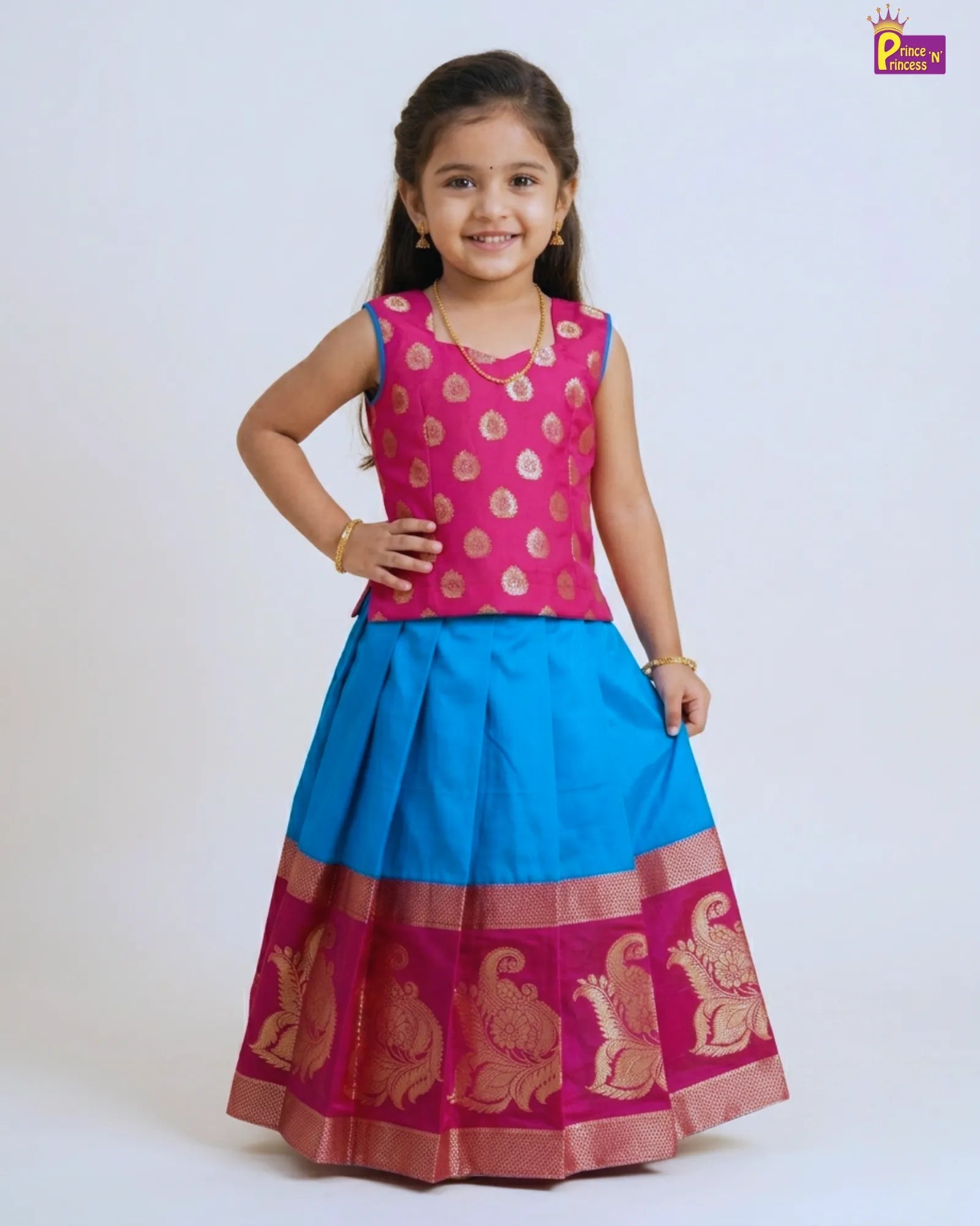 Girl wearing pink and sky blue raw silk Pattu Pavadai with Banarasi border for kids traditional festive wear