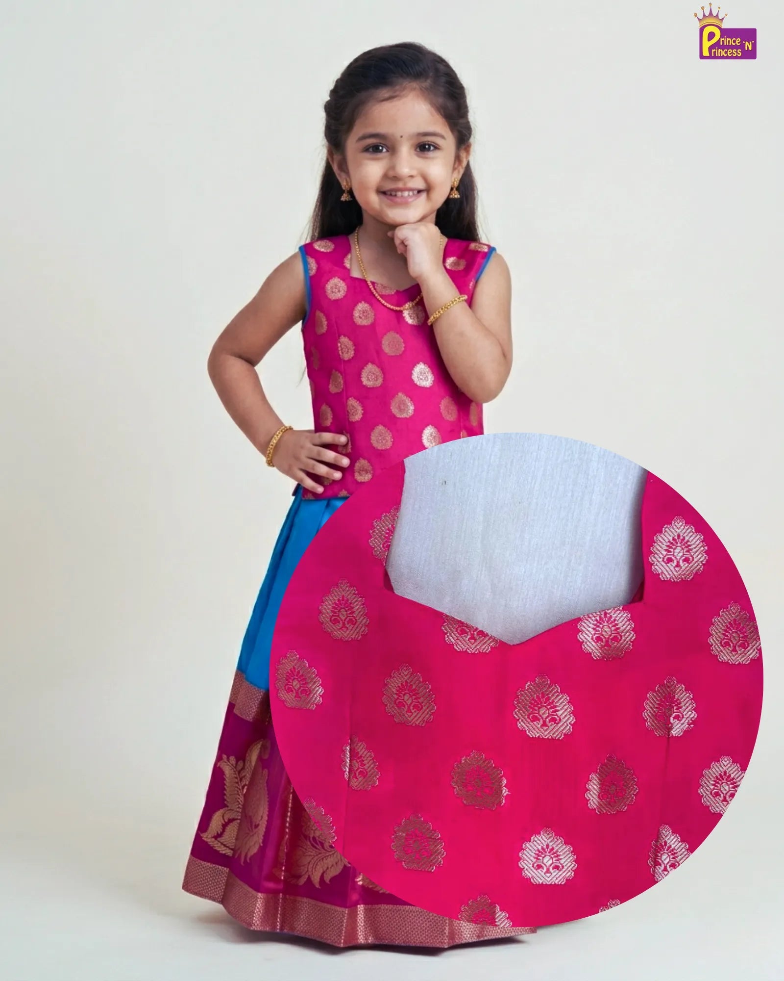 Girl wearing pink and sky blue raw silk Pattu Pavadai with Banarasi border for kids traditional festive wear