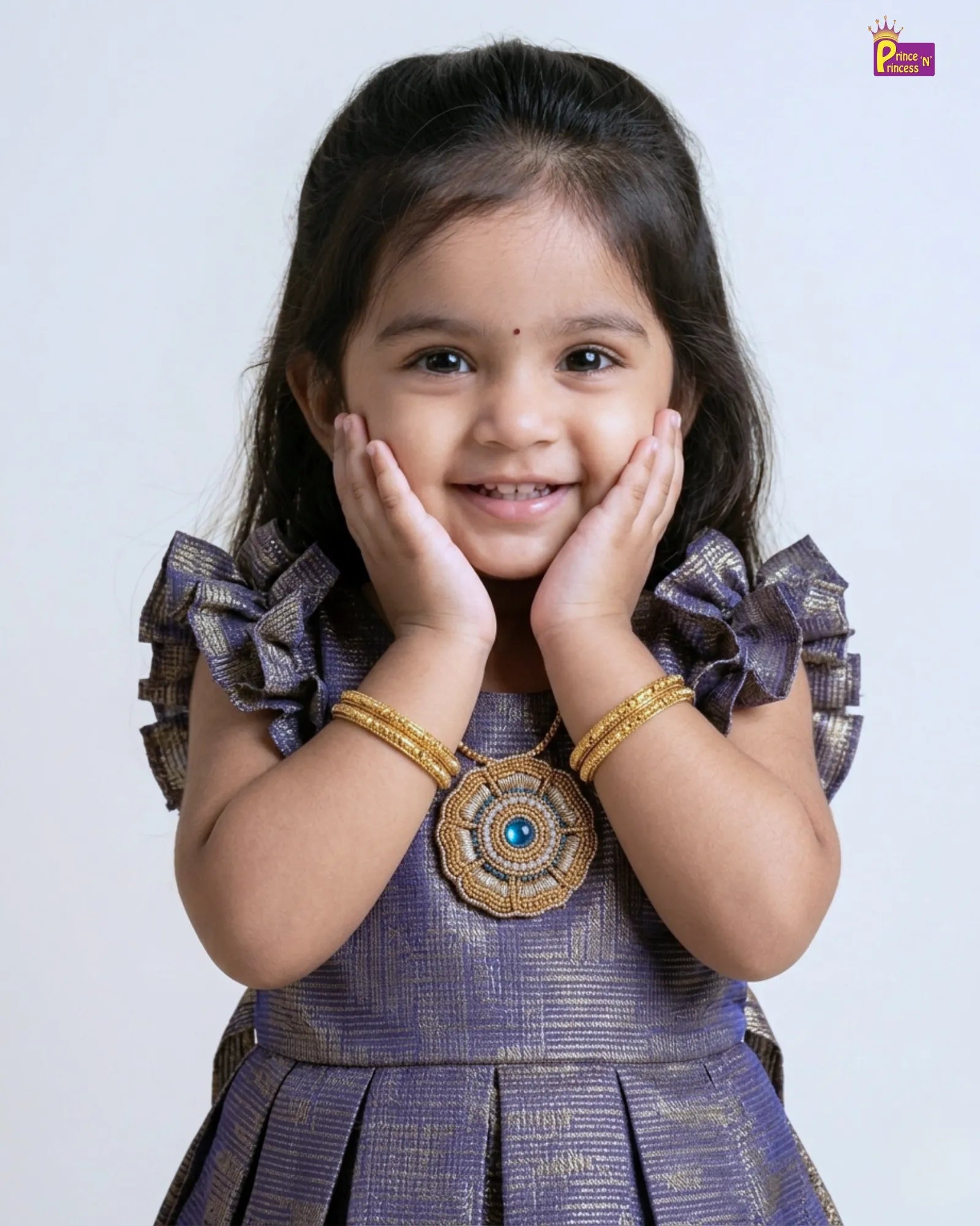Young girl in a traditional outfit with decorative elements on a plain background