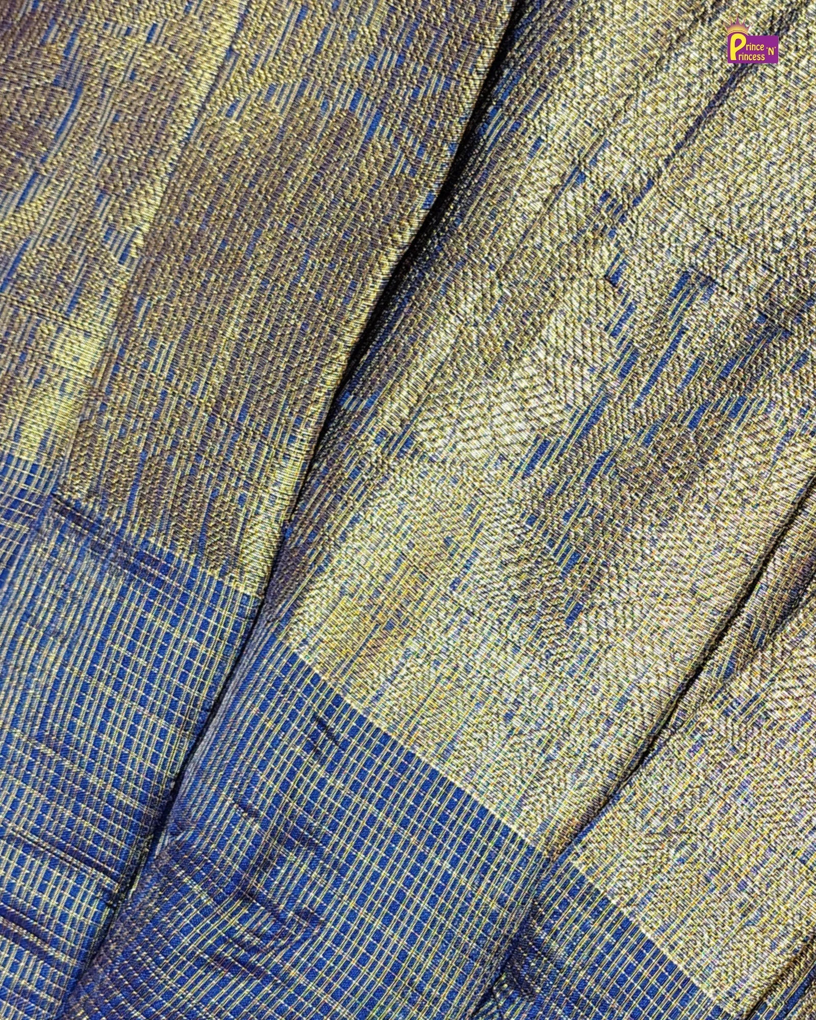Close-up of blue and gold patterned fabric