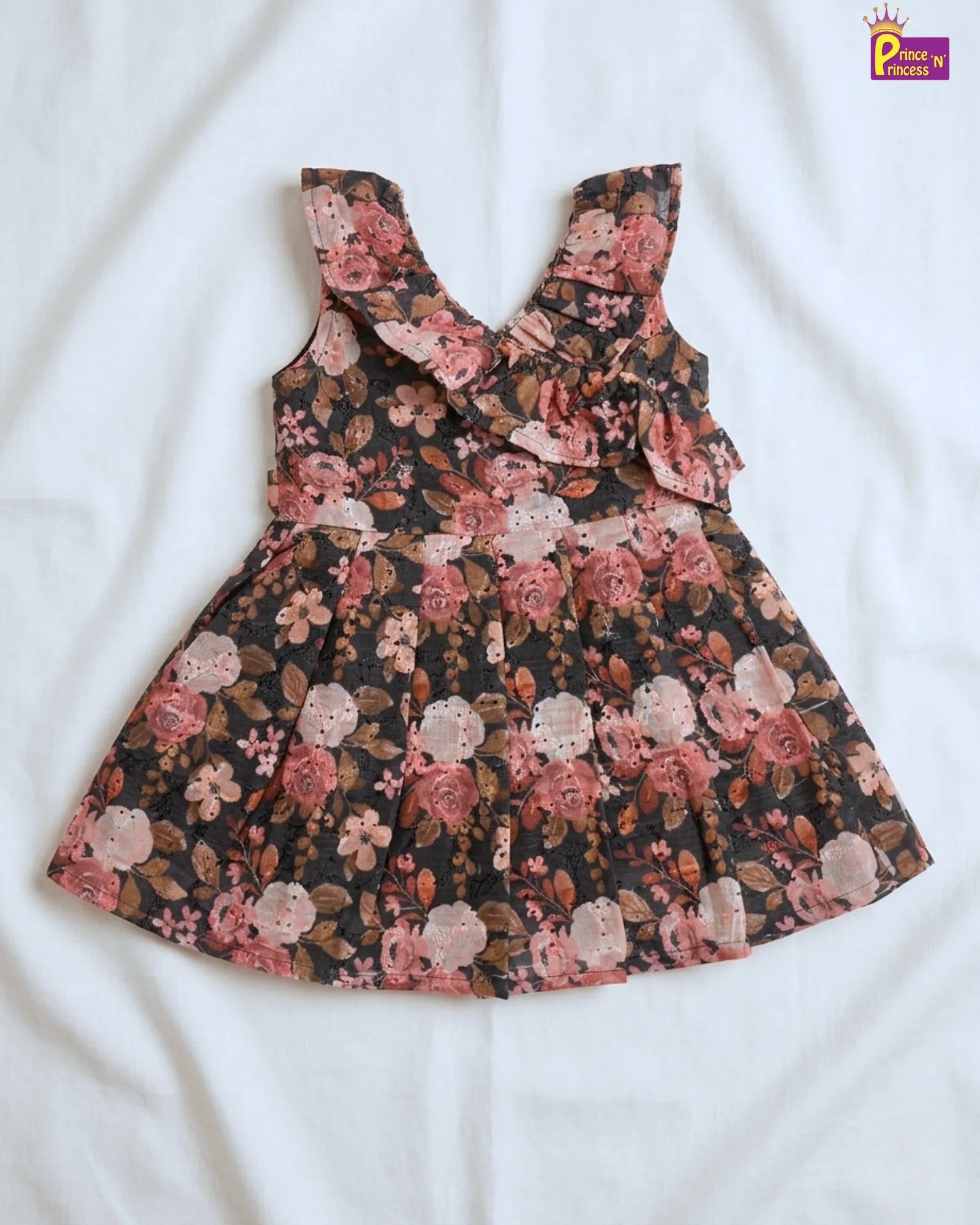 Floral dress with ruffled details on a white background