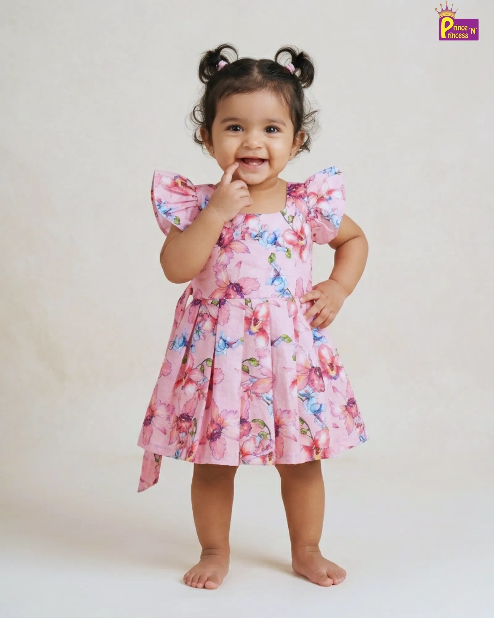 Baby girl wearing pink floral summer cotton frock casual kids outfit for outings and playtime
