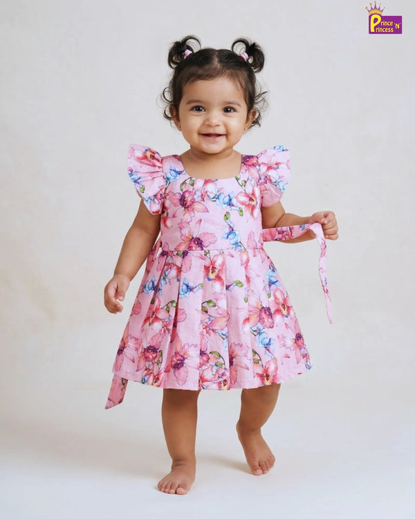 Baby girl wearing pink floral summer cotton frock casual kids outfit for outings and playtime