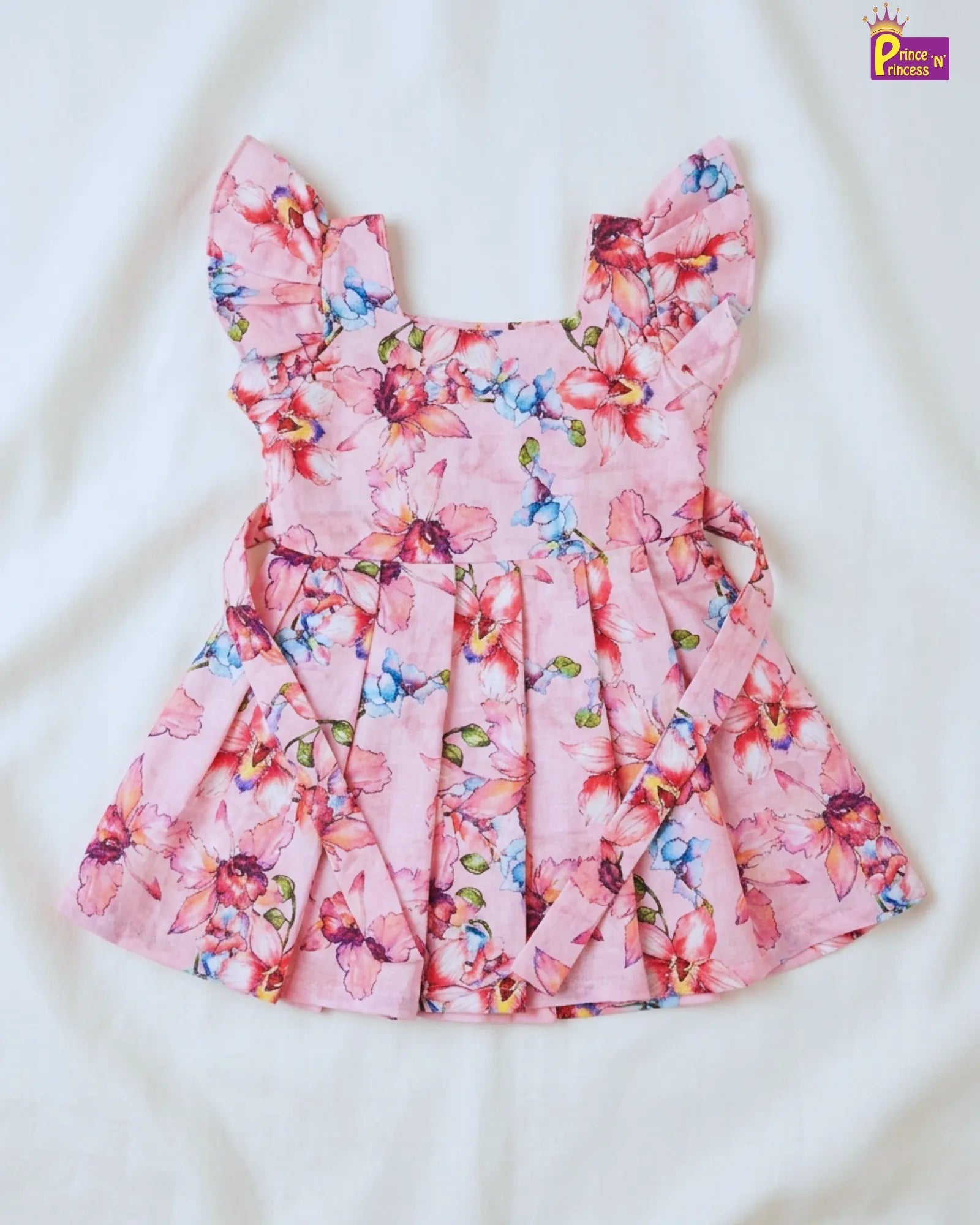 Pink floral dress on a white background