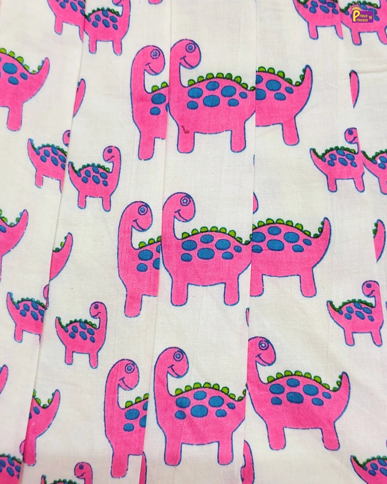 Pattern of pink dinosaurs with blue spots on a white background