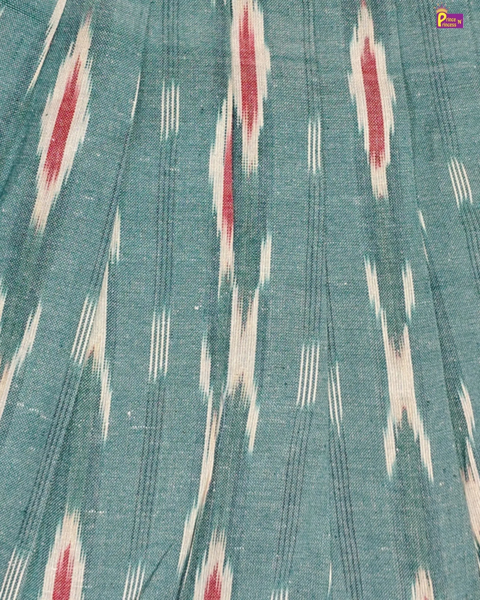 Textile fabric with a pattern of red and white triangles on a teal background