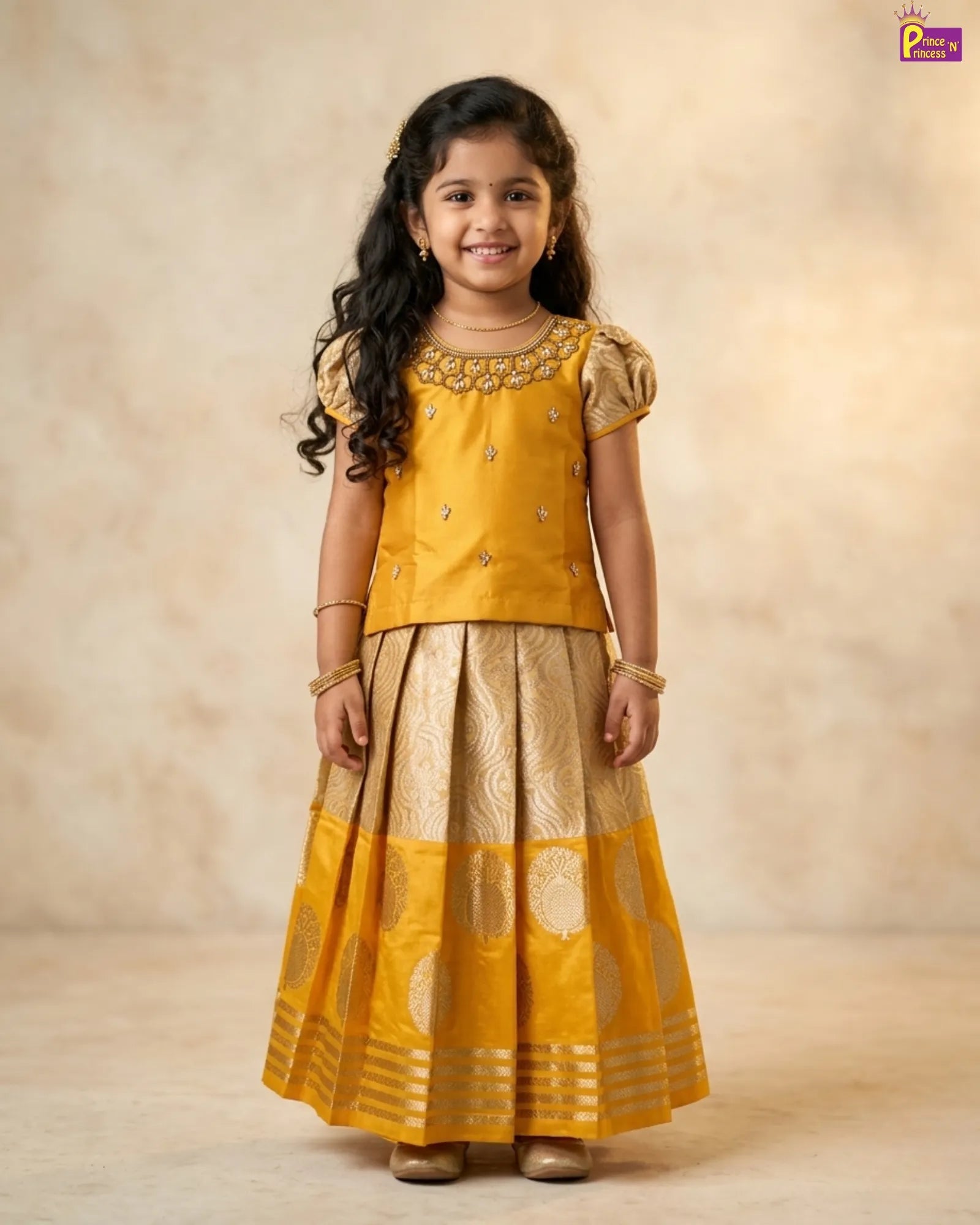 Young girl wearing a yellow traditional outfit with a beige background